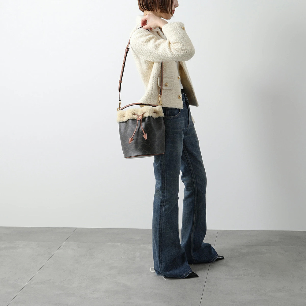Celine Bucket Clara handbag of Triomphe canvas shearling sheepskin lining Tan